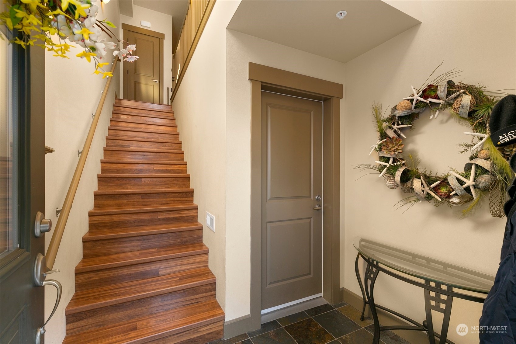 2115 201st Place Southeast, Unit B3 Bothell, WA 98012 - Photo 3 of 25 a view of entryway and hall with wooden floor