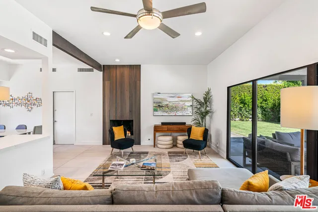 a living room with furniture and a couch