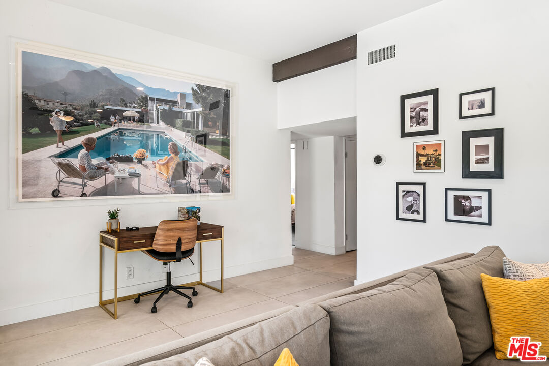 544 North Tercero Circle Palm Springs, CA 92262 - Photo 16 of 75 a living room with furniture and a dresser