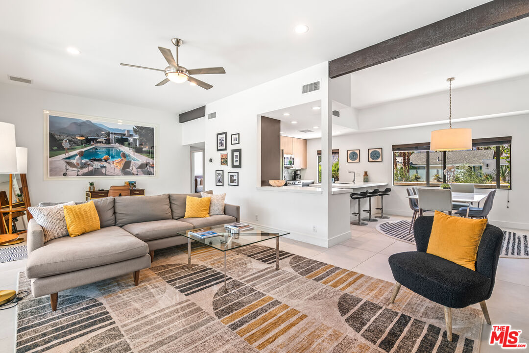 544 North Tercero Circle Palm Springs, CA 92262 - Photo 17 of 75 a living room with furniture kitchen view and a large window