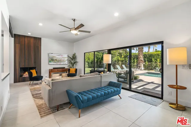 a outdoor living space with furniture and a large window