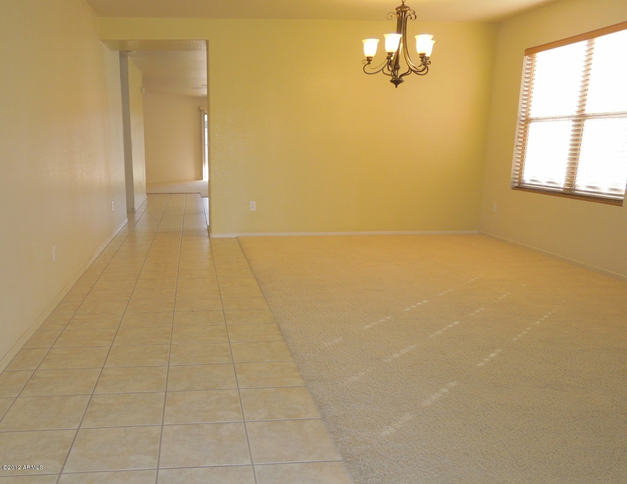 2417 West Romley Road Phoenix, AZ 85041 - Photo 4 of 24 Dining room and Living room