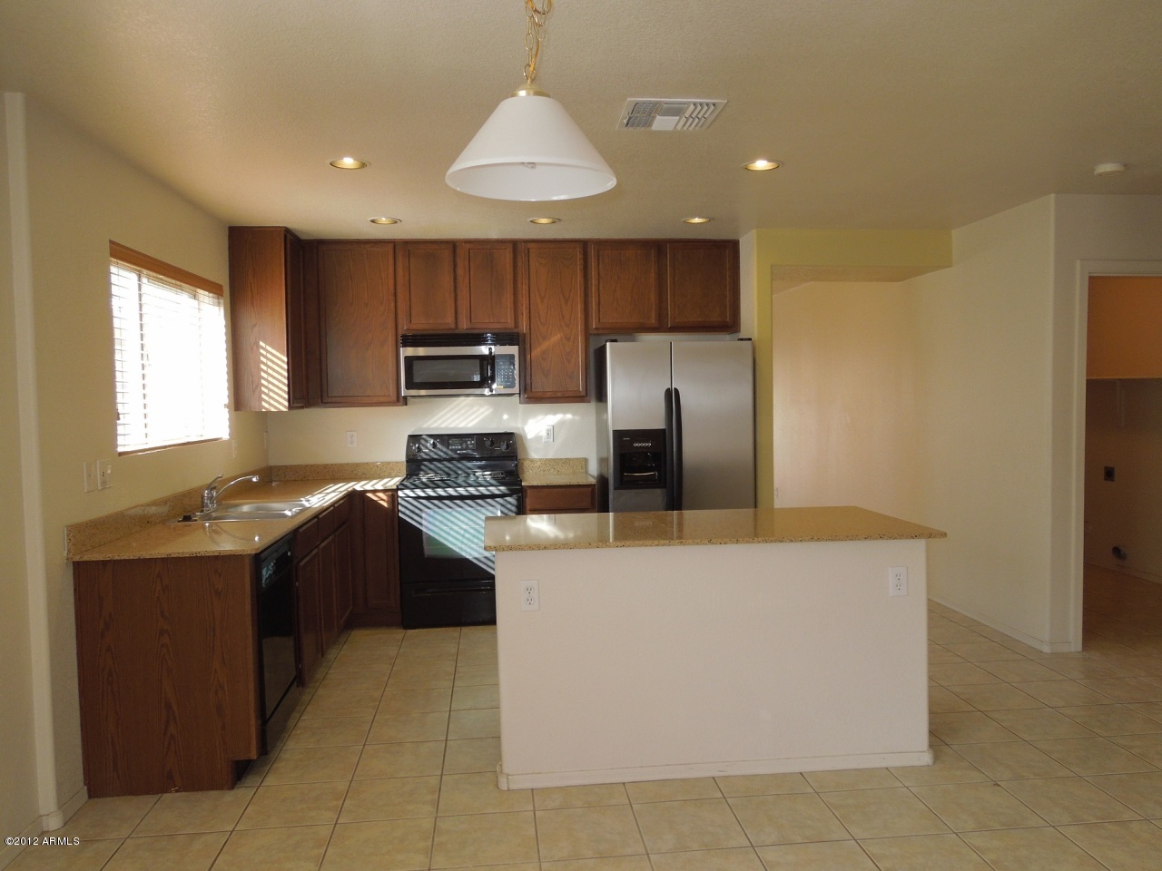 2417 West Romley Road Phoenix, AZ 85041 - Photo 8 of 24 Spacious Island Granite Kitchen