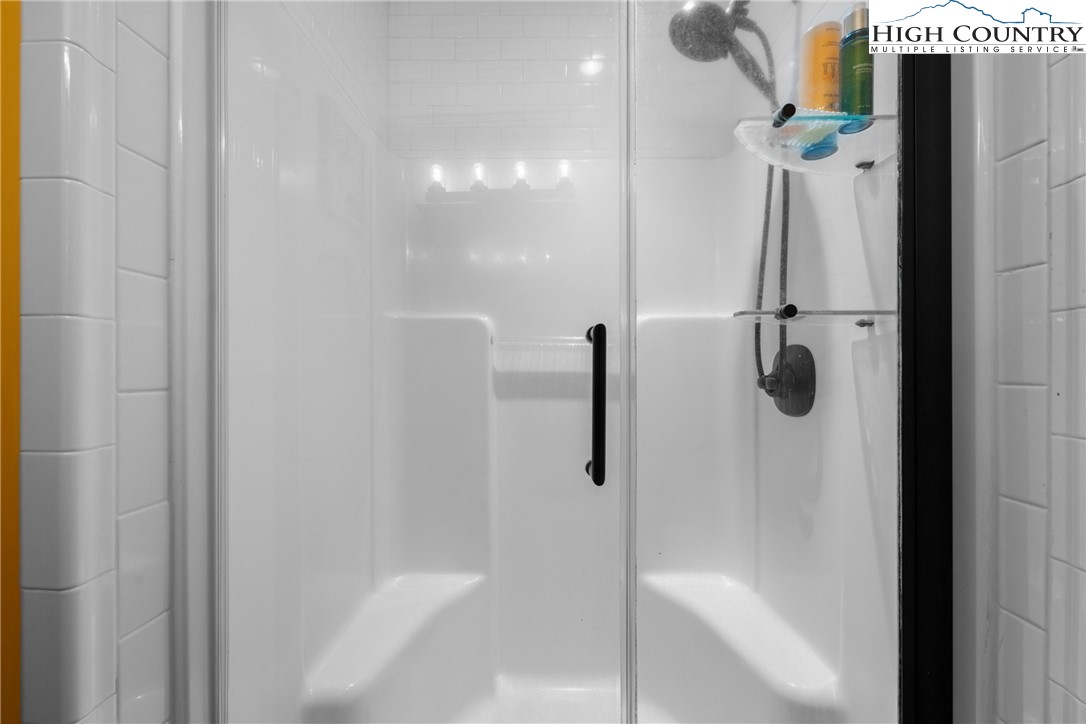 126 Moore Mountain Road Vilas, NC 28692 - Photo 24 of 43 a bathroom with a shower