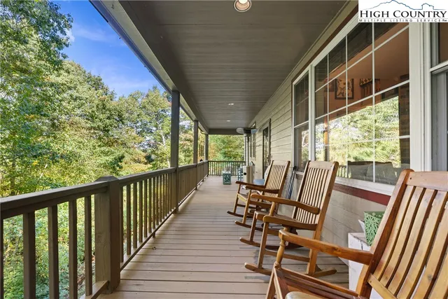 a view of an chairs and table in the balcony