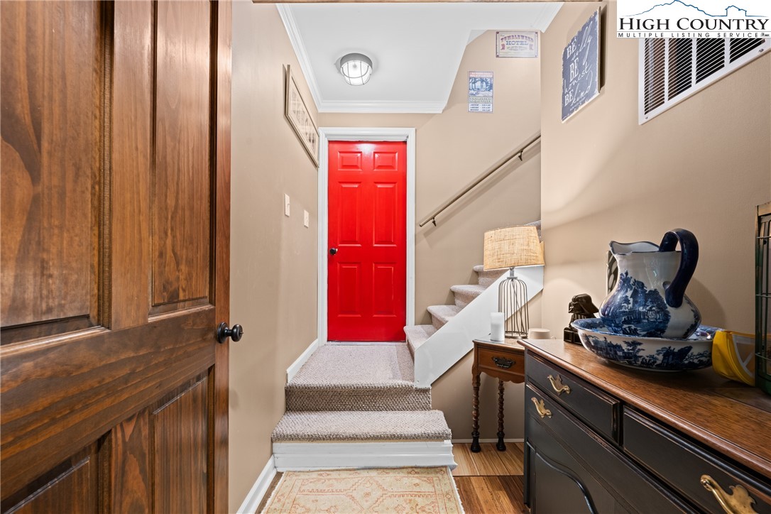 126 Moore Mountain Road Vilas, NC 28692 - Photo 27 of 43 a bathroom with a sink and a mirror
