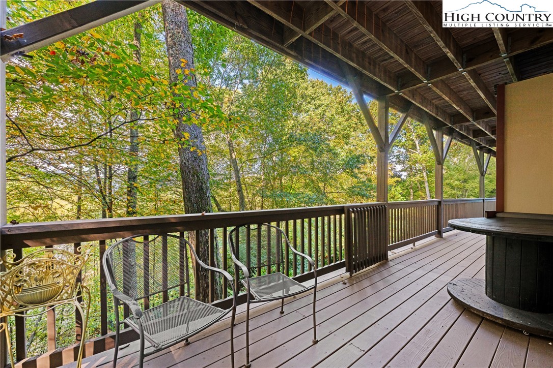 126 Moore Mountain Road Vilas, NC 28692 - Photo 34 of 43 a view of balcony with wooden floor