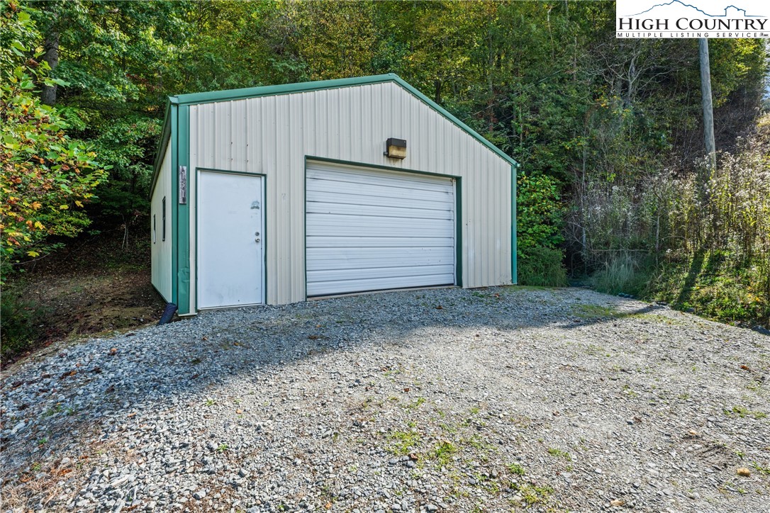 126 Moore Mountain Road Vilas, NC 28692 - Photo 38 of 43 a view of backyard of house