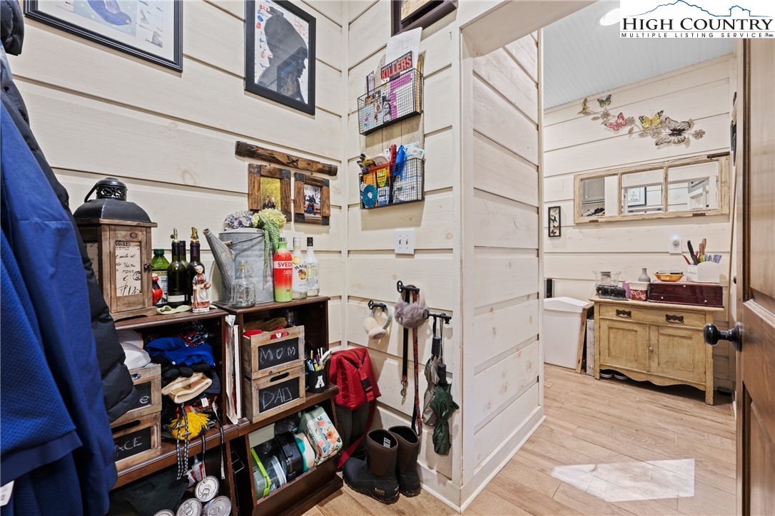 126 Moore Mountain Road Vilas, NC 28692 - Photo 10 of 43 a view of walk in closet with clothes and shoes