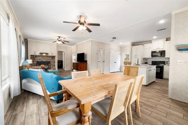 a bathroom with a sink mirror and toilet
