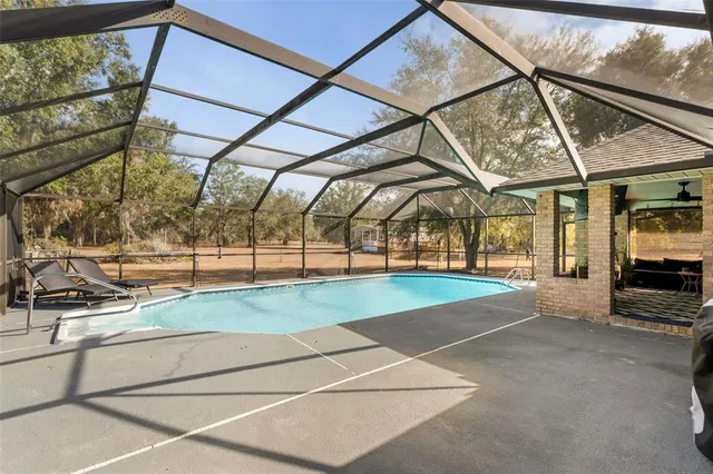 a living room with patio furniture