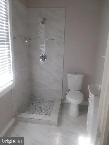 a view of a city with tall buildings