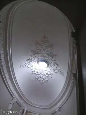 a view of a chandelier in a livingroom