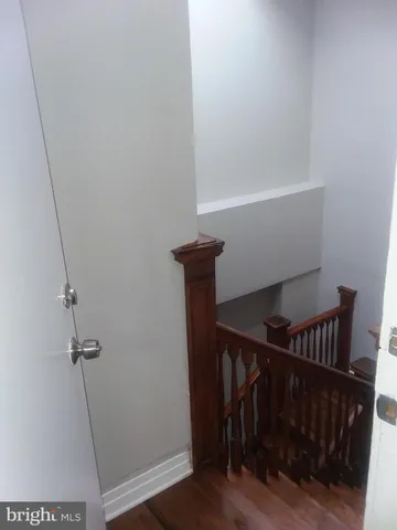 a stove top oven sitting inside of a kitchen