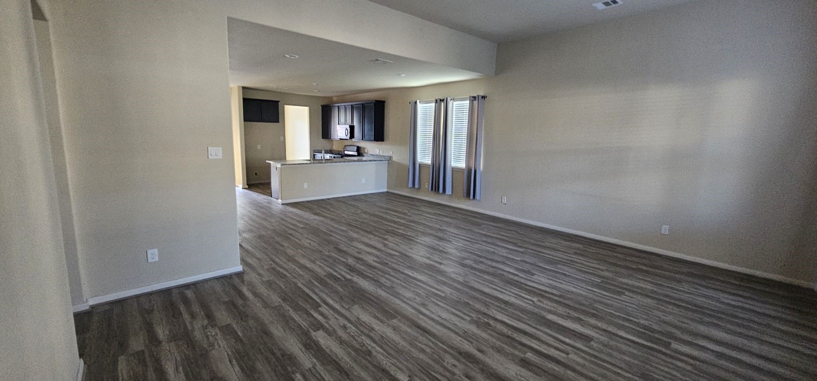 15602 Egret Field Lane Houston, TX 77049 - Photo 4 of 11 a view of a kitchen from the hallway with a sink
