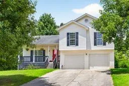 a front view of house with yard