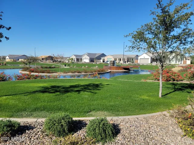 a view of a garden with houses