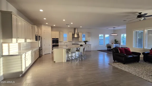 a view of a dining area with furniture window and wooden floor