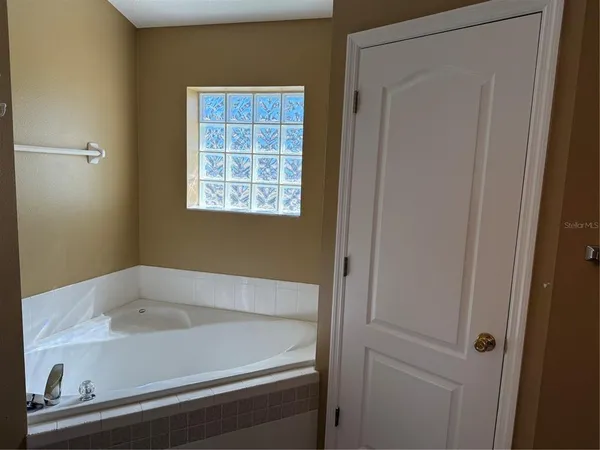 a bathroom with a bathtub