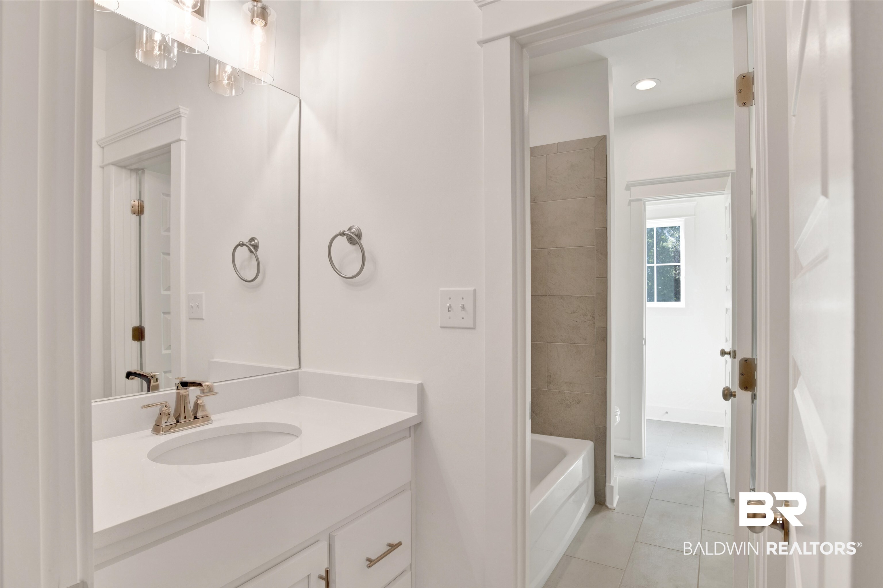 5 Long Leaf Circle Fairhope, AL 36532 - Photo 32 of 44 Jack and Jill Bathroom featuring tile patterned flooring and vanity