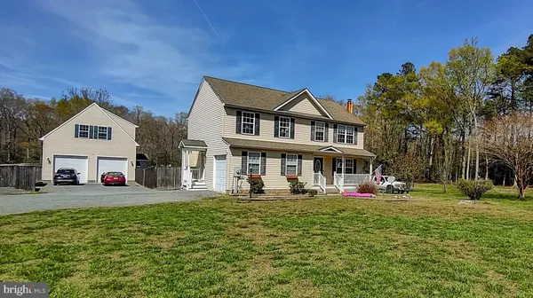 a view of a backyard with plants