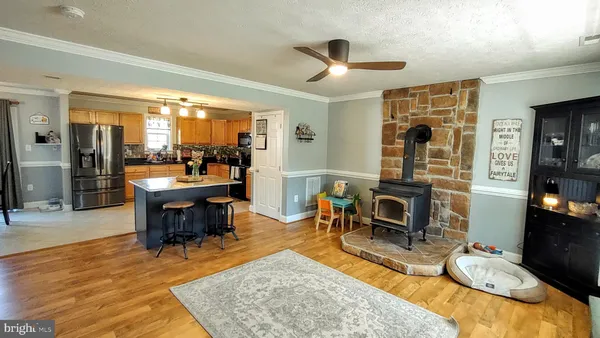 a bedroom with baby bed and window