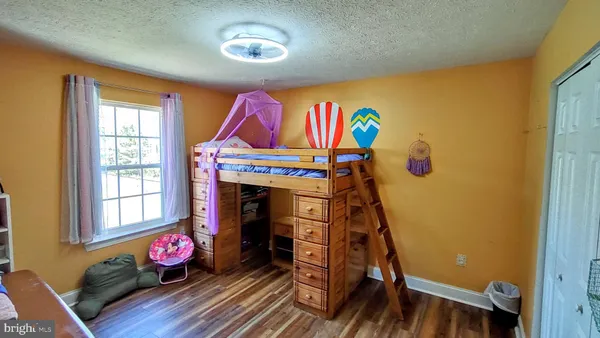a view of a playground with a swimming pool
