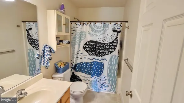 a view of a house with a door and wooden floor