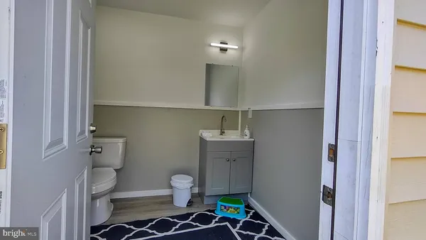 a bedroom with furniture and a bed