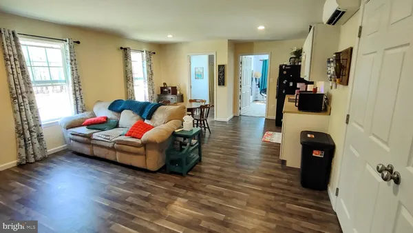 a view of a backyard with swimming pool