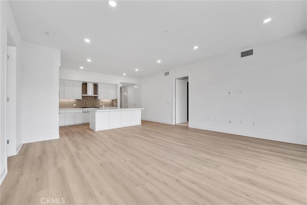 4302 Rivington Irvine, CA 92612 - Photo 22 of 62 a view of kitchen with wooden floor