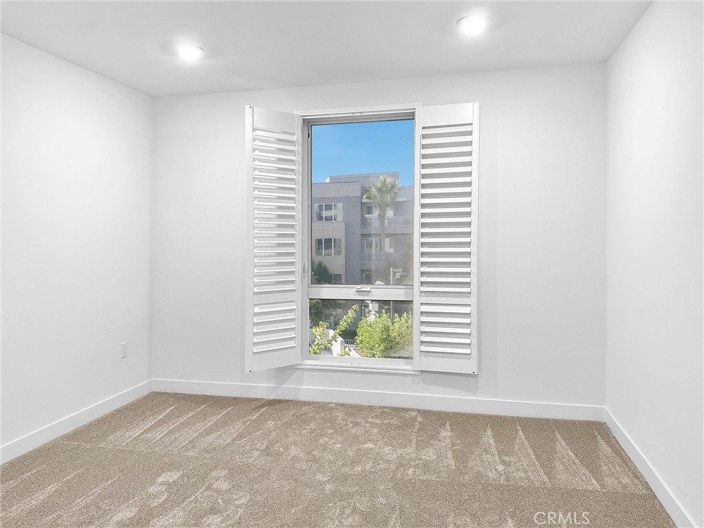 4302 Rivington Irvine, CA 92612 - Photo 25 of 62 a view of an empty room with a window