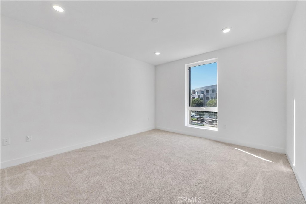 4302 Rivington Irvine, CA 92612 - Photo 28 of 62 a view of an empty room with a window