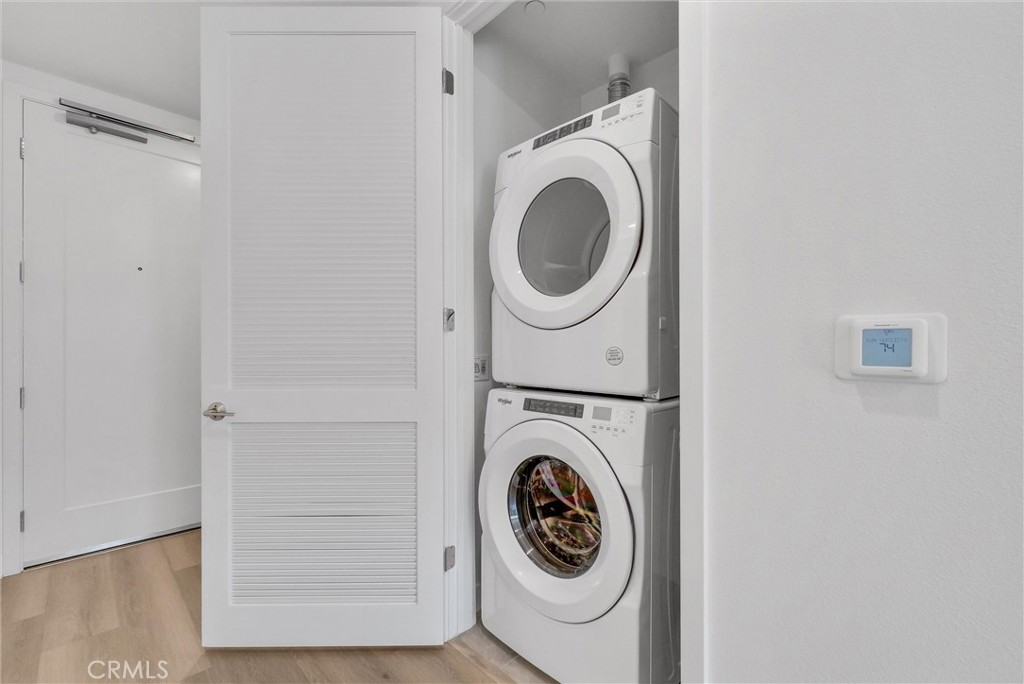 4302 Rivington Irvine, CA 92612 - Photo 8 of 62 a utility room with dryer and washer