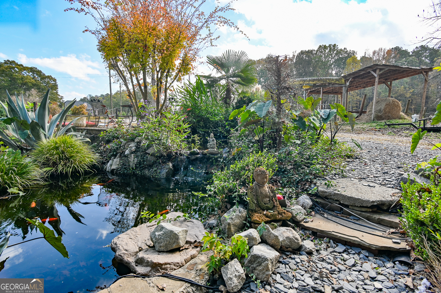 11725 Hazelbrand Road Northeast Covington, GA 30014 - Photo 18 of 71 a backyard of a house with lots of green space