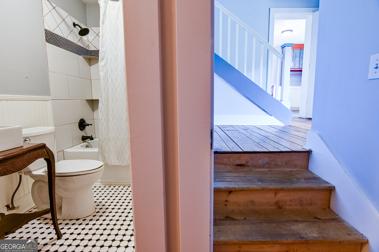 11725 Hazelbrand Road Northeast Covington, GA 30014 - Photo 44 of 71 a bathroom with a toilet a sink and mirror