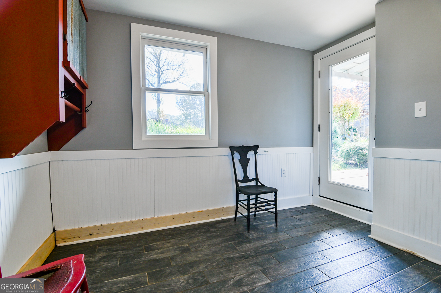 11725 Hazelbrand Road Northeast Covington, GA 30014 - Photo 46 of 71 a view of an empty room with window and hardwood floor