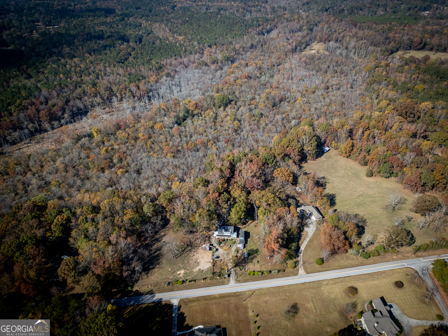 11725 Hazelbrand Road Northeast Covington, GA 30014 - Photo 6 of 71 a view of a wooden floor with a lake view