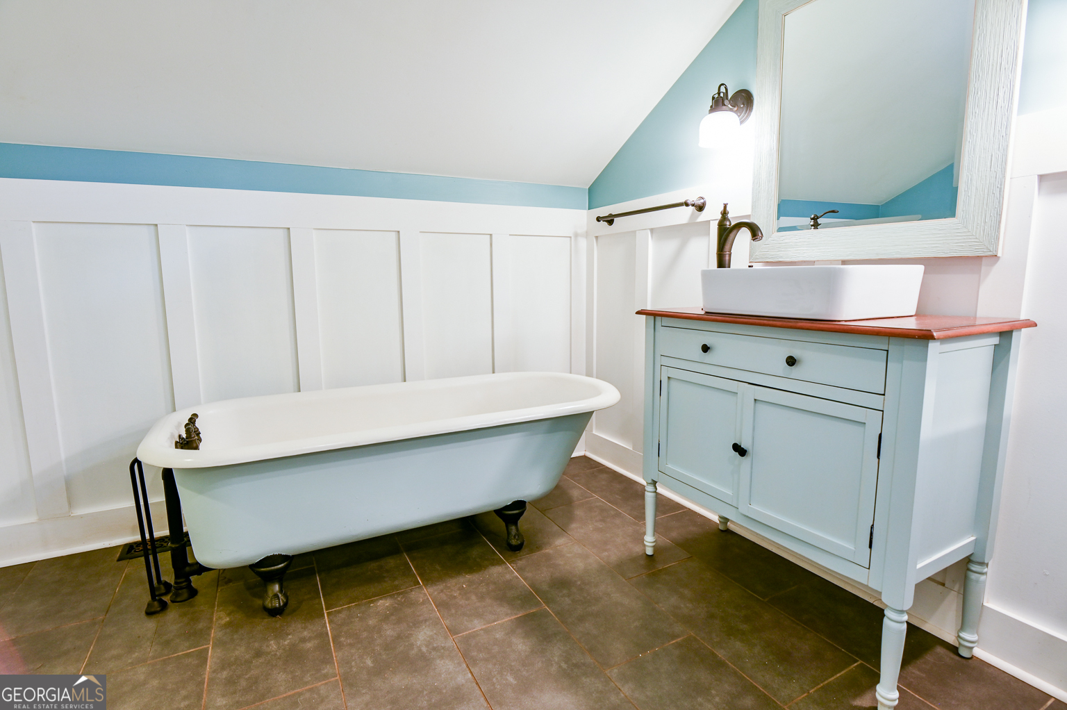 11725 Hazelbrand Road Northeast Covington, GA 30014 - Photo 62 of 71 a room with table chair and wooden floor