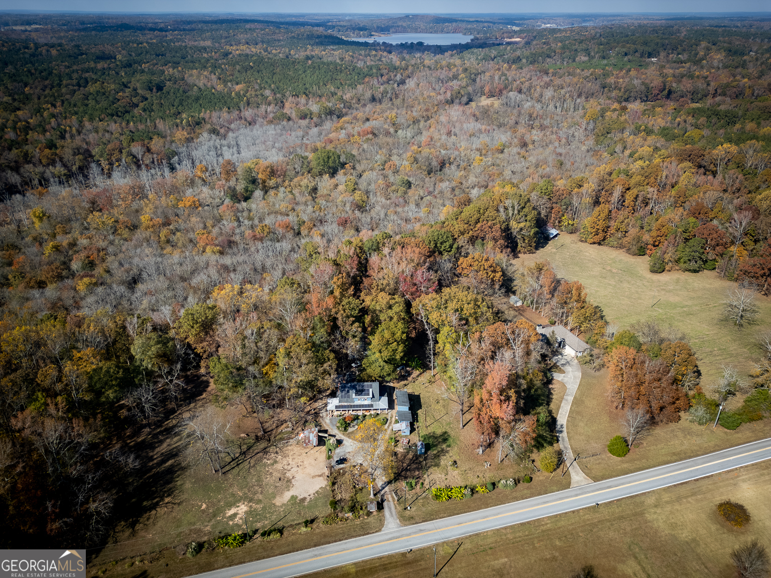 11725 Hazelbrand Road Northeast Covington, GA 30014 - Photo 8 of 71 a view of a yard with wooden fence