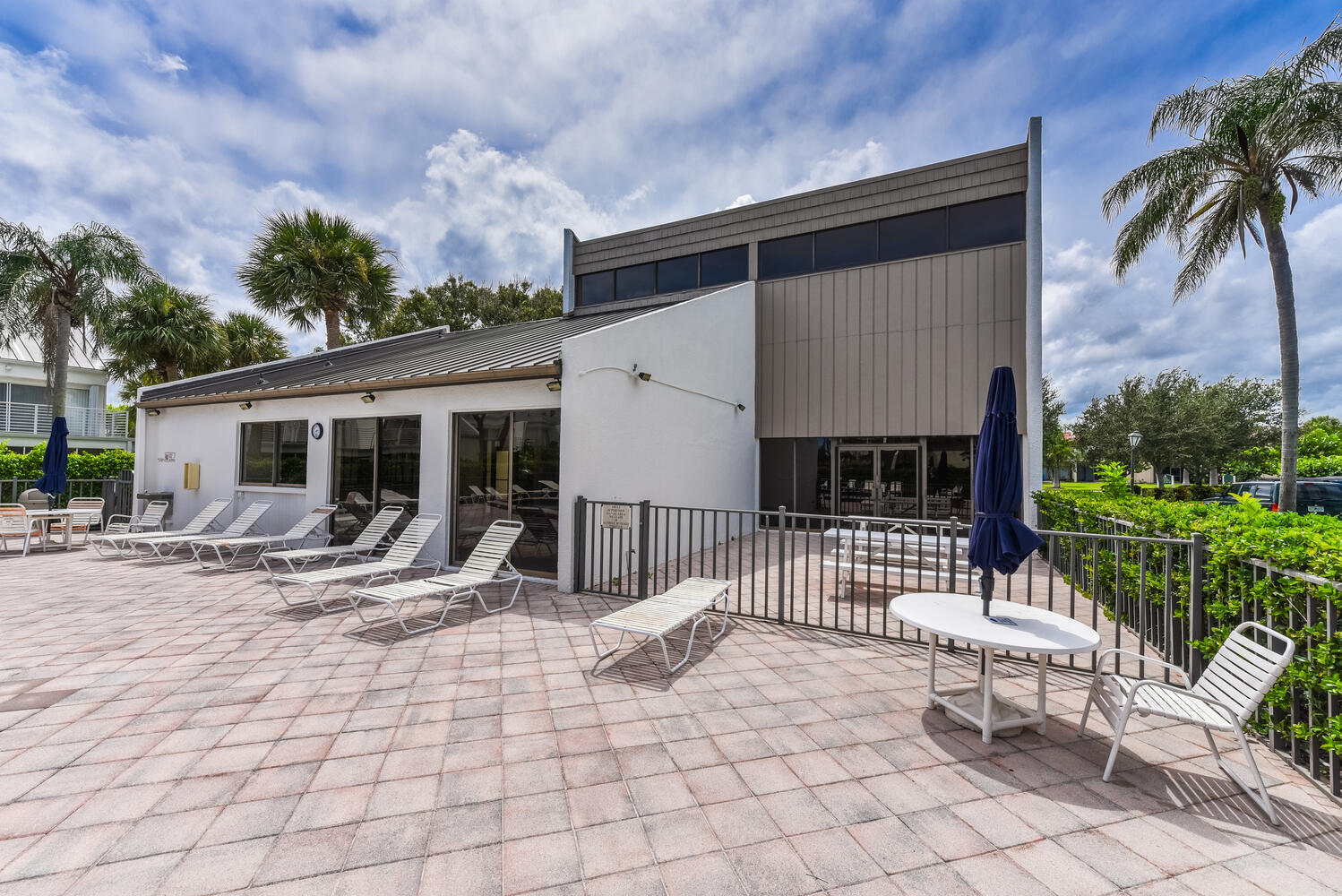 1605 Highway 1, Unit M3502 Jupiter, FL 33477 - Photo 27 of 38 Clubhouse view from pool