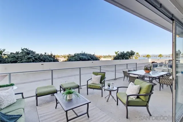 a bedroom with a bed and a table