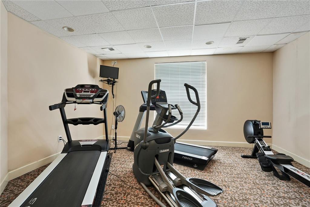 3203 Lenox Road Northeast, Unit 6 Atlanta, GA 30324 - Photo 26 of 27 a view of a room with gym equipment