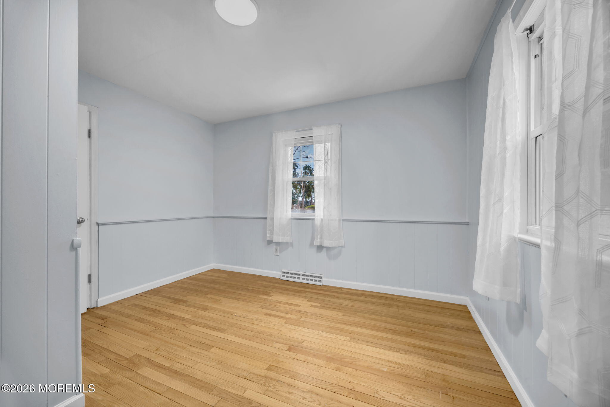 108 Susan Drive Ewing, NJ 08638 - Photo 13 of 40 a view of empty room with wooden floor