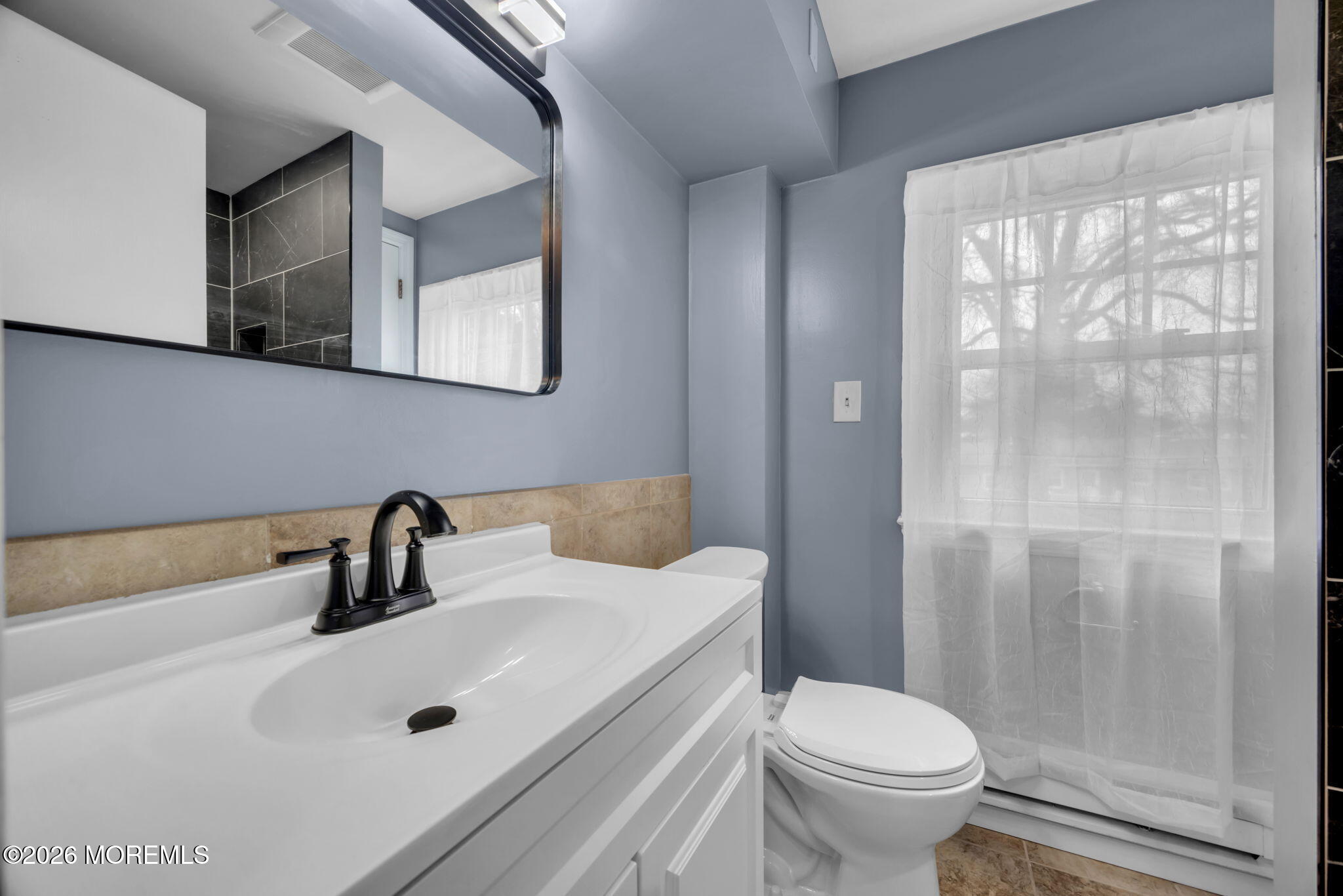 108 Susan Drive Ewing, NJ 08638 - Photo 23 of 40 a bathroom with a sink a toilet and shower