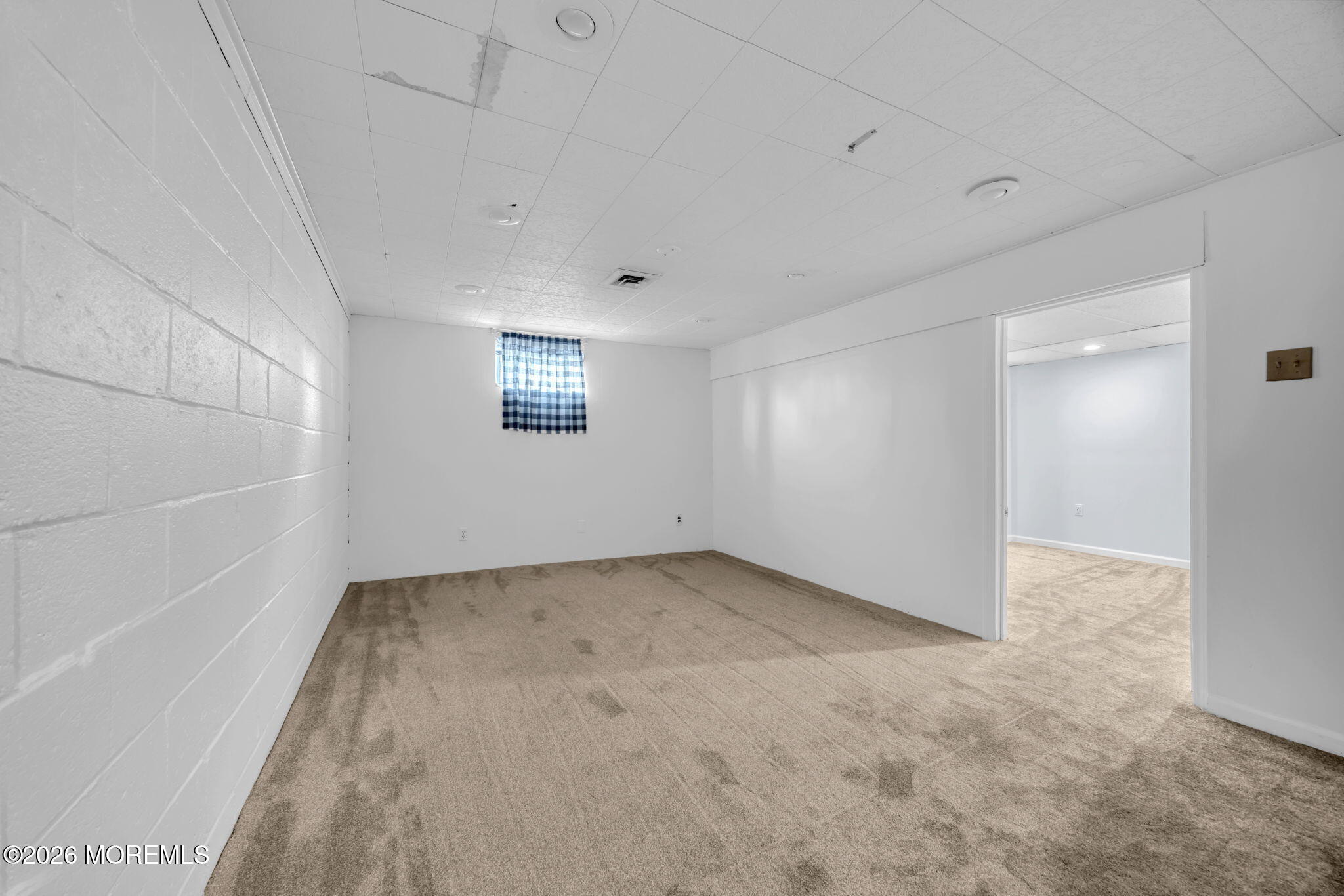 108 Susan Drive Ewing, NJ 08638 - Photo 24 of 40 an empty room with a empty space and windows