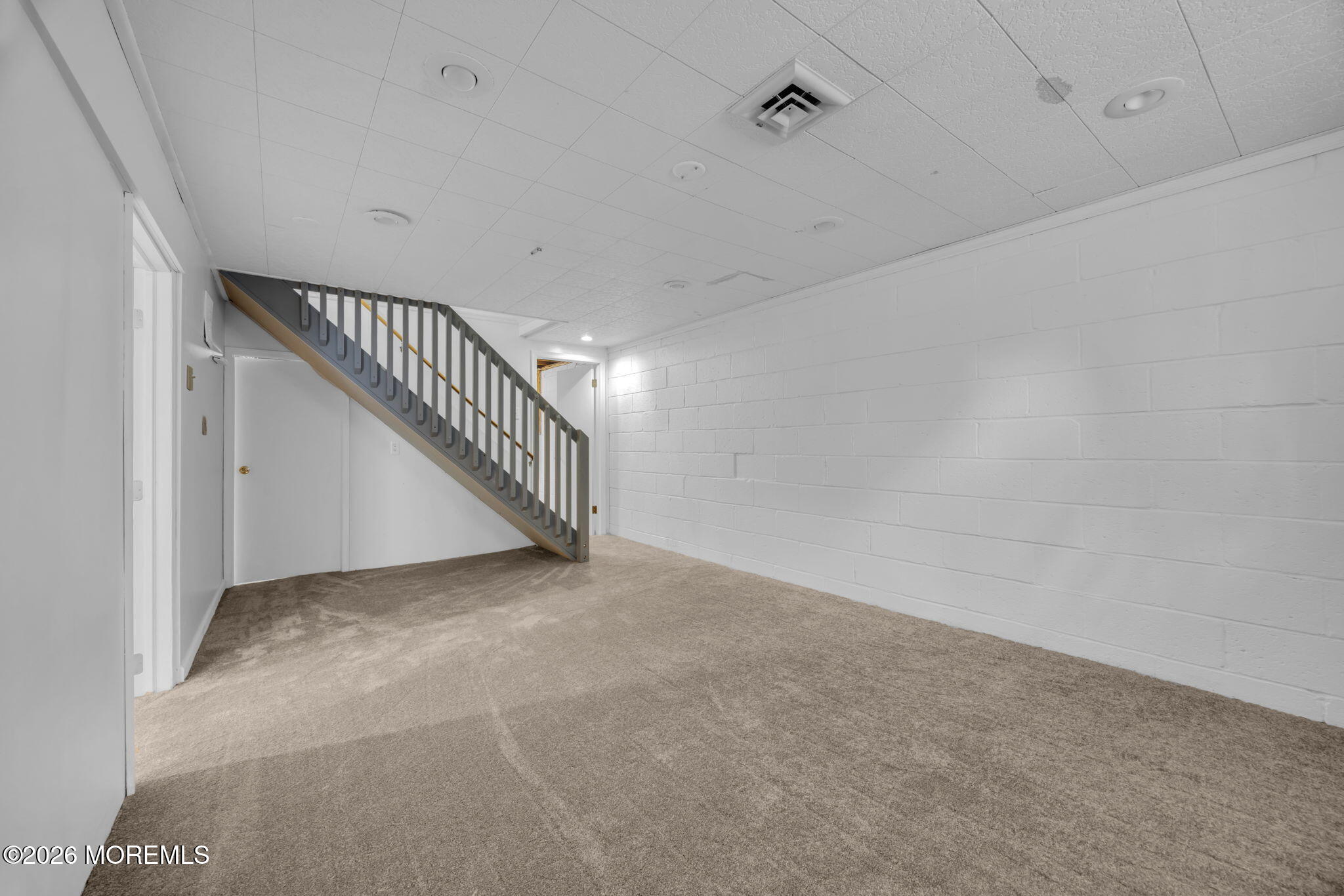 108 Susan Drive Ewing, NJ 08638 - Photo 25 of 40 a view of an empty room with stairs
