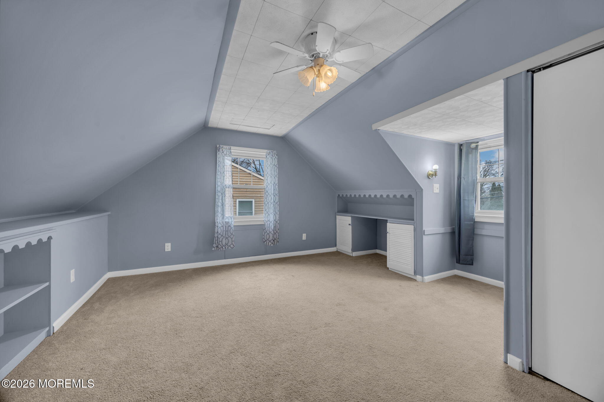 108 Susan Drive Ewing, NJ 08638 - Photo 30 of 40 an empty room with a empty space and a ceiling fan