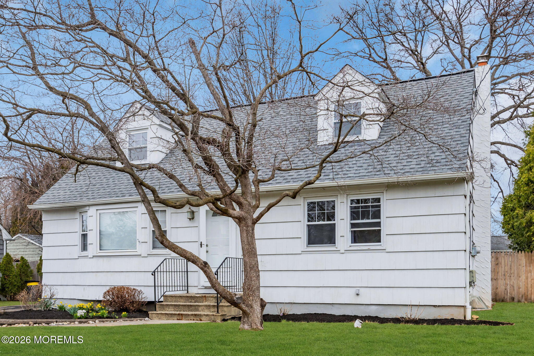 108 Susan Drive Ewing, NJ 08638 - Photo 4 of 40 a white house that has tree in front of it