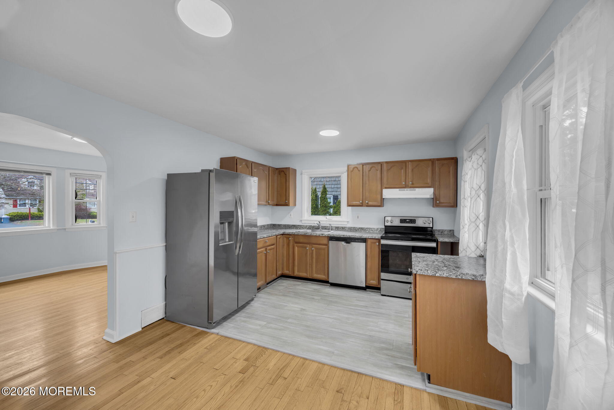 108 Susan Drive Ewing, NJ 08638 - Photo 9 of 40 a kitchen with stainless steel appliances granite countertop a refrigerator a stove top oven a sink and dishwasher